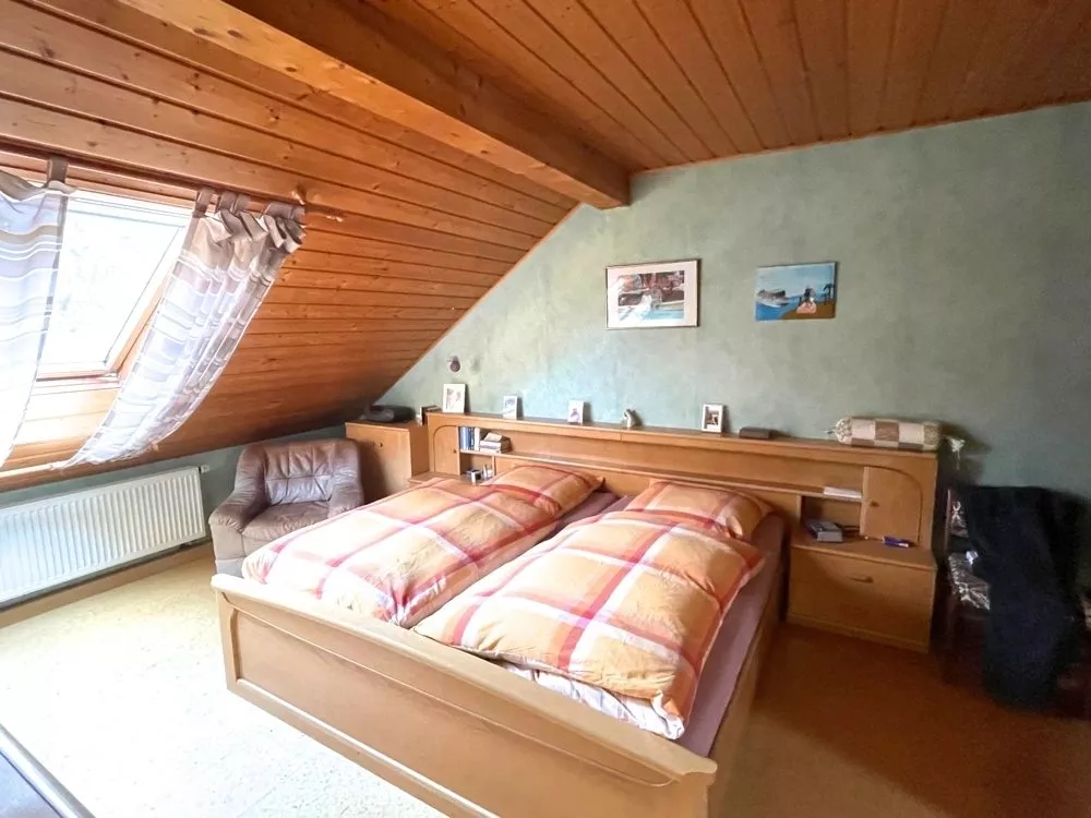 Immobilienangebot - Eßweiler - Alle - Keine Lust auf Gartenarbeit? Sehr gepflegtes Einfamilienhaus mit Wintergarten auf kleinem Grundstück