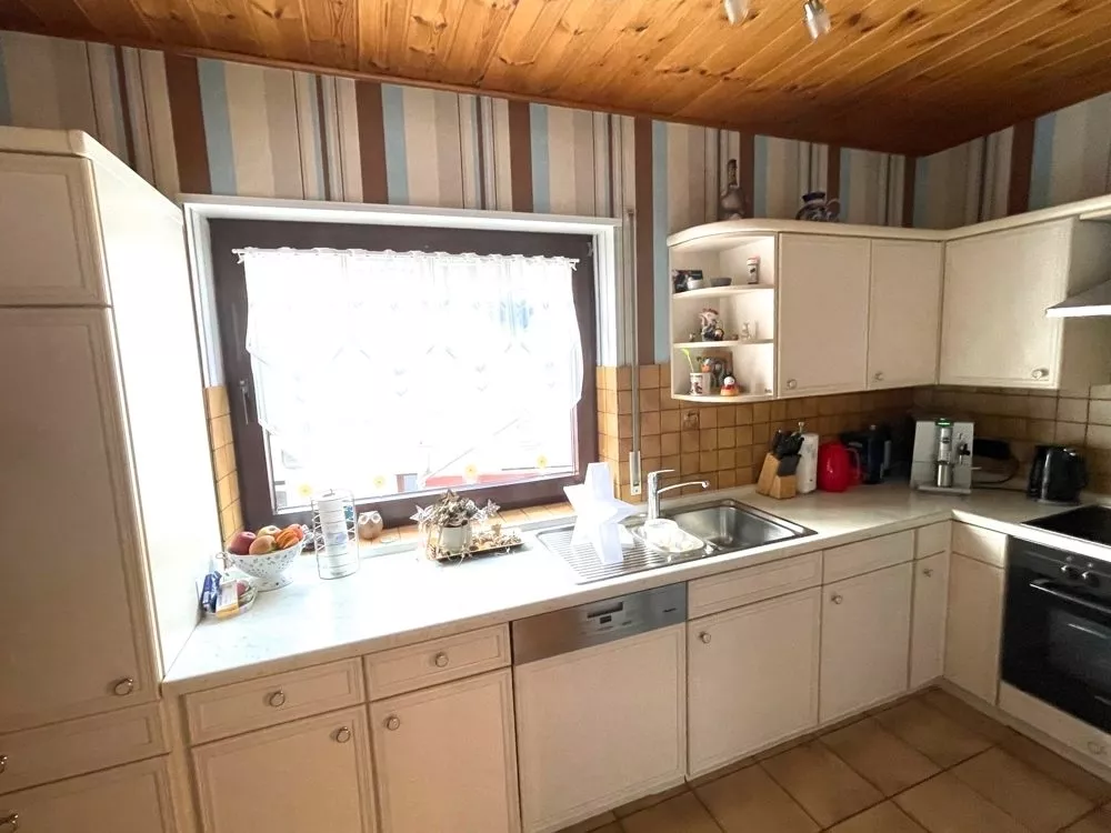 Immobilienangebot - Eßweiler - Alle - Keine Lust auf Gartenarbeit? Sehr gepflegtes Einfamilienhaus mit Wintergarten auf kleinem Grundstück