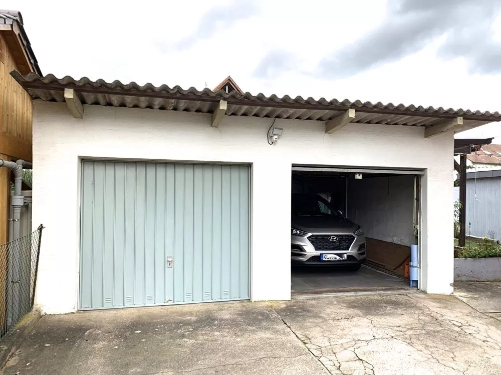 Immobilienangebot - Ramstein-Miesenbach - Alle - Gepflegtes Zweifamilienhaus mit 3 Garagen in ruhiger Seitenstraße