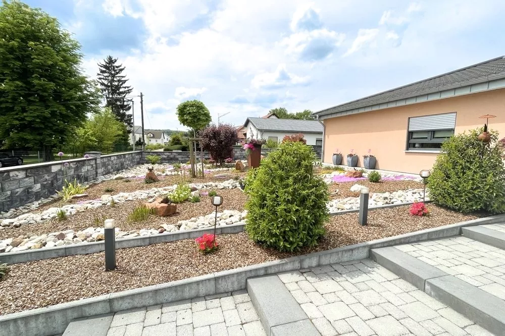 Immobilienangebot - Neunkirchen - Alle - Dolce Vita an der Blies - Toskanischer Winkelbungalow mit exklusiver Ausstattung
