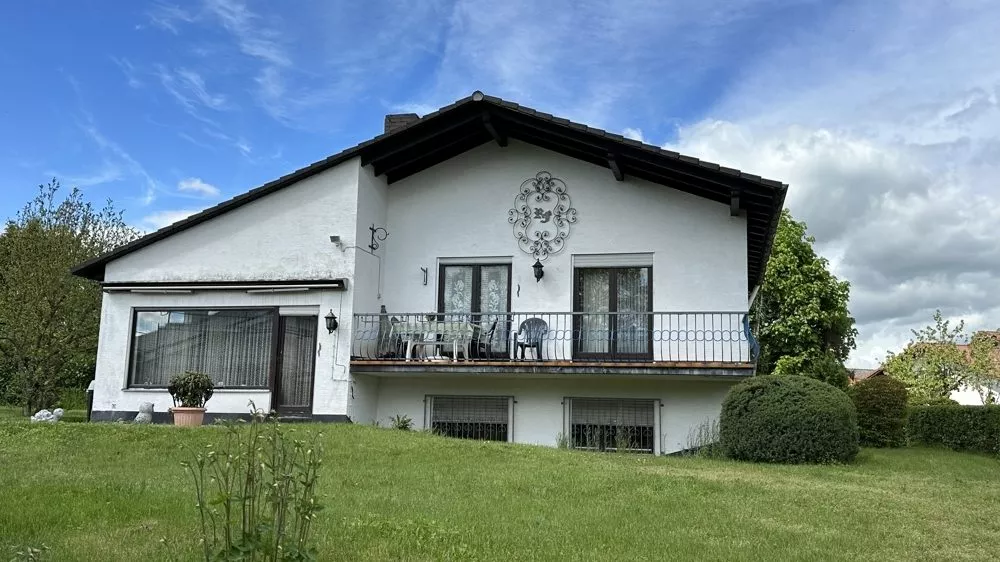 Immobilienangebot - Weilerbach - Alle - Split-Level-Bungalow mit großzügigem Grundstück und 2 Garagen
